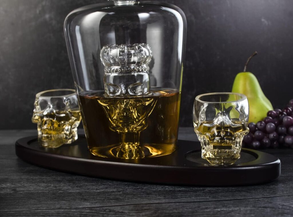 Skull Skeleton Wine  Whiskey Decanter Set 750 mL With 2 Skull 3oz Skeletons Shot Glasses + Mahogany Wooden Base  Pouring Spigot Decor Glass, Goth Spooky Drinking Glassware The Wine Savant